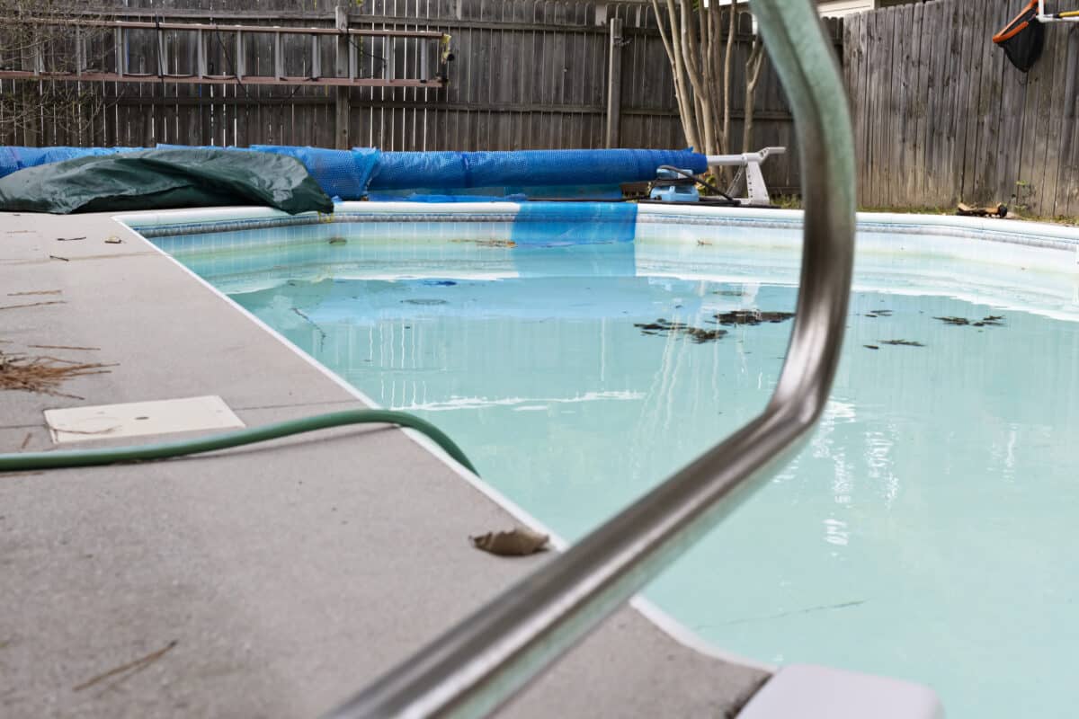 old swimming pool with falling