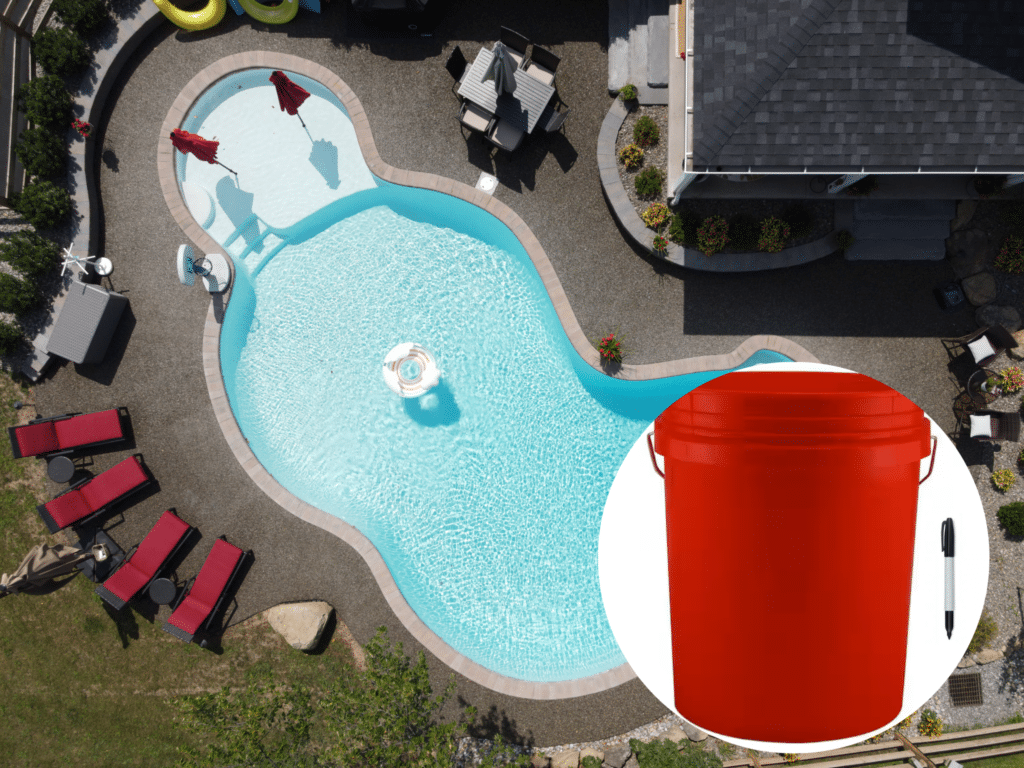 bucket and marker next to a pool